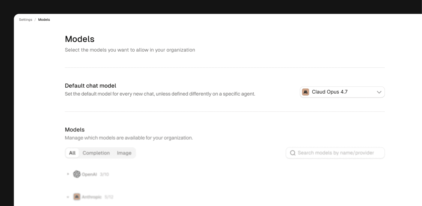 Settings > Models page showing default chat model dropdown and provider list